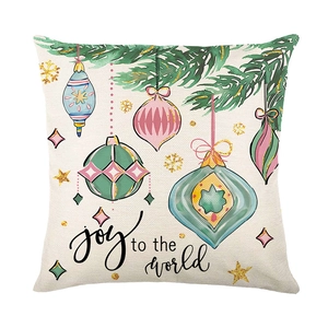 Christmas pillow cover with joy to the world quote and ornaments on white background