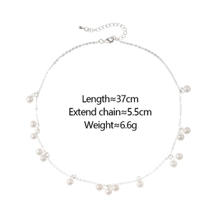 Elegant minimalist white pearl choker necklace with gold metal chain and lobster clasp