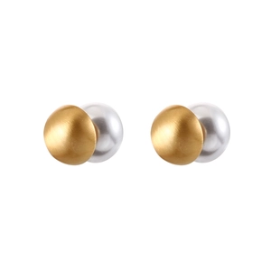 Detail of matte gold brushed studs with white pearls in a double-ball French design