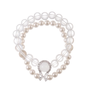 Elegant double-layer pearl bracelet featuring zircon-encrusted accents and a bow charm