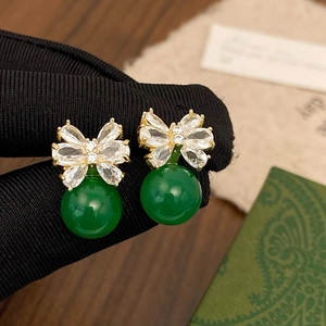 Elegant bow-knot earrings with white zircon and emerald green spherical drop pendants