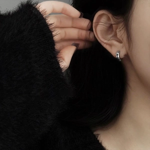 Sleek silver bamboo-style huggie hoop earrings for women with minimalist U-shaped design