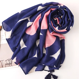 Navy blue cotton linen scarf with pink abstract floral patterns and fringe details