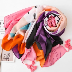 Bohemian floral cotton linen scarf with colorful abstract print and pink tassels