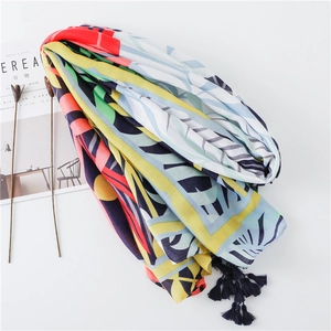 Floral print cotton linen scarf with tropical leaves and tassel edges for summer vacation