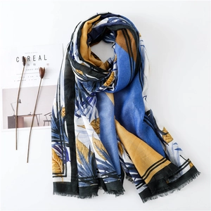 Lightweight botanical leaf print shawl scarf with fringe details for summer beach sun protection