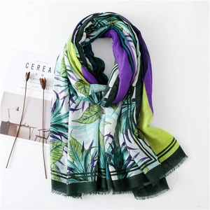 Tropical palm leaf print shawl with frayed edges for summer beach sun protection
