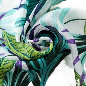 Lightweight tropical leaf print shawl for beach sun protection with frayed edges