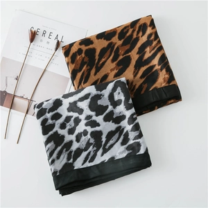 Thick leopard print cotton linen scarves in brown and grey with black border finish