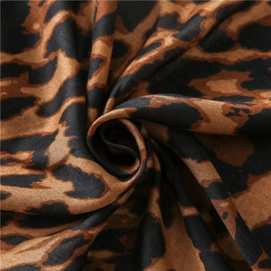 Macro detail of soft cotton-linen fabric with stylish leopard print pattern texture