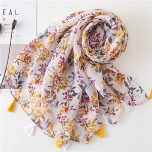 Floral cotton linen scarf with yellow leaves print and decorative fringe tassels for women