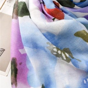 Macro detail of soft twill multi-color printed linen-feel scarf with artistic dye patterns