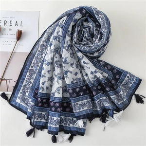 Blue and white floral ethnic scarf with tassels and bohemian porcelain style pattern