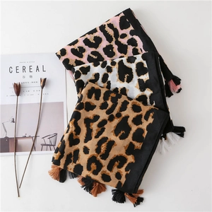 Leopard print tassel scarves in pink white and brown colors with a soft linen touch