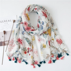 Chic white cotton linen shawl with colorful floral prints and tassel fringe decor