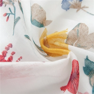 Detail showing the floral print texture and soft weave of the cotton linen shawl