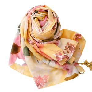 Lightweight cotton-linen floral scarf with tassels in yellow and pink gradient tones