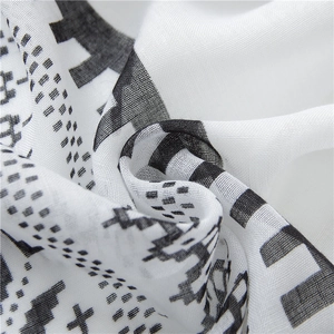 Macro view of lightweight black and white geometric pattern cotton linen scarf fabric