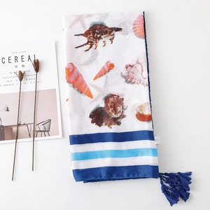 Lightweight shell pattern scarf with nautical blue stripes and fringe tassels