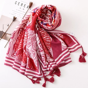 Red paisley floral cotton linen scarf with tassels and bohemian print for beach sun protection