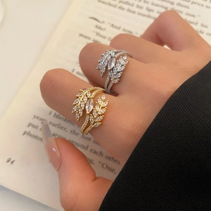 Adjustable leaf rings in gold and silver finish with sparkling pave zircons