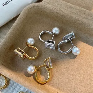 Square zircon and pearl C-shaped earrings in gold and silver finish, minimalist style