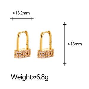 Retro geometric door lock earrings in gold with white cubic zirconia pavé setting