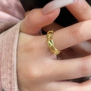 Minimalist gold bamboo joint adjustable open ring for women on finger model