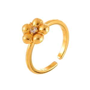 Minimalist gold flower ring with brushed texture and sparkling center zircon crystal