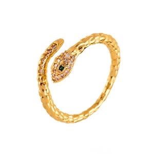 Golden snake-shaped wrap ring featuring green gemstone eyes and sparkling zircon accents