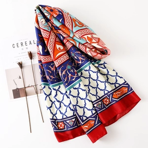 Detailed view of bohemian style cotton linen scarf with geometric ethnic totem patterns