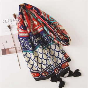 Ethnic bohemian cotton linen scarf with floral print and black fringes for beach sun protection