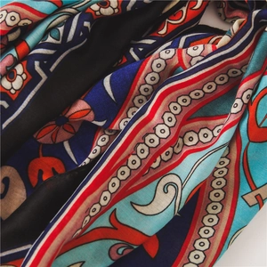 Ethnic bohemian print scarf in vibrant blue and orange silk-like soft fabric shawl