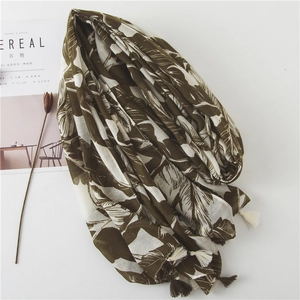 Brown and white tropical leaf print long scarf with tassels on white background