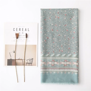 Floral print cotton-feel light blue scarf with tassels and ethnic geometric patterns