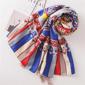 Bohemian paisley print scarf in navy blue and red with soft pink tassel edges