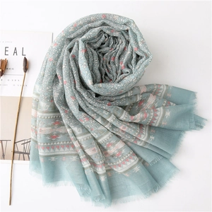 Floral cotton linen scarf in mint green with bohemian pattern and frayed edges