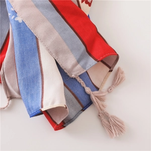 Bohemian striped summer shawl with elegant tassels and smooth satin finish texture