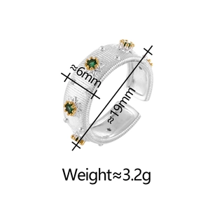 Vintage silver star ring with green gemstone and gold octagram, adjustable open band