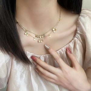 Elegant double-layered gold disc necklace for women in minimalist street style