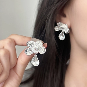 French style silver floral stud earrings with teardrop charm and crystal center detail