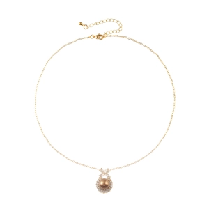 Elegant gold bow necklace featuring brown pearl and cubic zirconia stones on white background