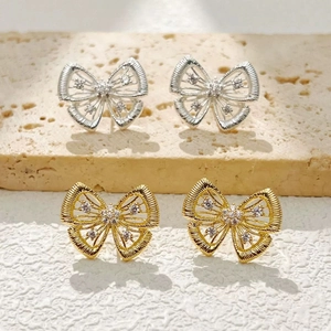 Boucles d'oreilles nœuds vintage français avec zircons en or et argent