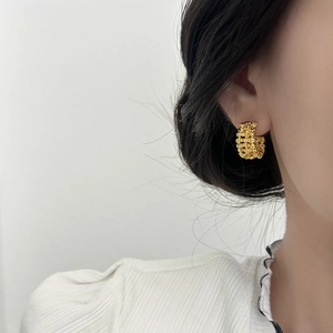 French style gold textured C-shape hoop earrings with hollow woven design for women