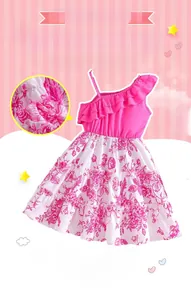 Detail of pink one-shoulder ruffle top and floral tiered skirt for girls