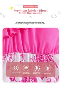 Detail of pink ruffled edge and floral cotton fabric showing breathable texture