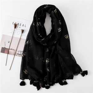 Elegant black cotton linen scarf with gold swallow foil print and tassel hem for women