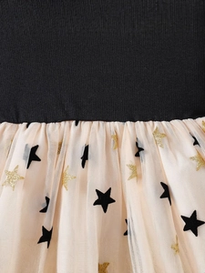 Girls' knitted dress with black ribbed top and star patterned tulle skirt for summer