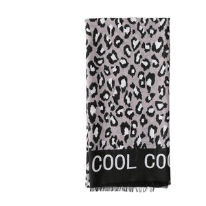 Classic leopard print long scarf for women featuring a black border and fringe detail