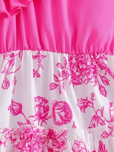 Girl's white floral sundress featuring rose prints and ruffled rose red shoulder straps